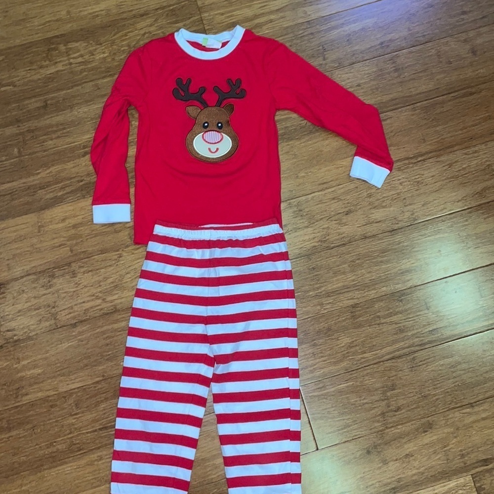 Boys holiday pajamas size 10. Red appliquéd reindeer pajamas with striped bottom